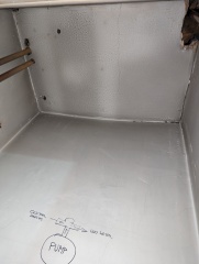 Hot water cylinder cupboard now empty, but new pipes in use