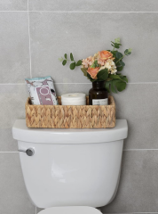 Where does the spare loo roll live?