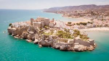 Destination with a new hotel by and old town and beach, not too £££