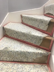 Housing Ass. Contractors didn’t finish job and comm. staircase is now lethal danger.