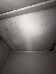 Hot water cylinder cupboard now empty, but new pipes in use