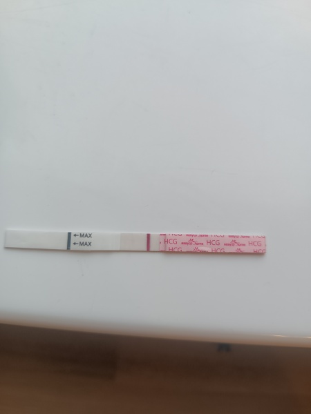 Faint line 9dpo