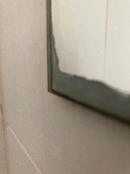 Can anyone help? Horrible mirror firmly stuck to wall