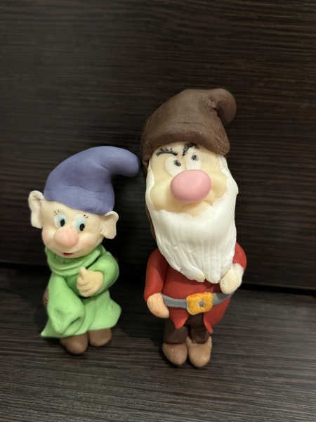 Please can you be honest. Making cake toppers for dd birthday, should I give up now (pics attached)