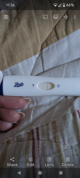 12 DPO faint line - am I pregnant?