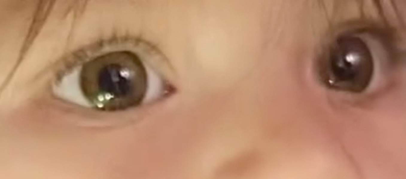 my baby is now 1 year old eyes are greyish very light grey in light but looks darker sometimes