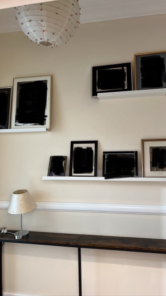 Help me decide layout of photo shelves in hallway