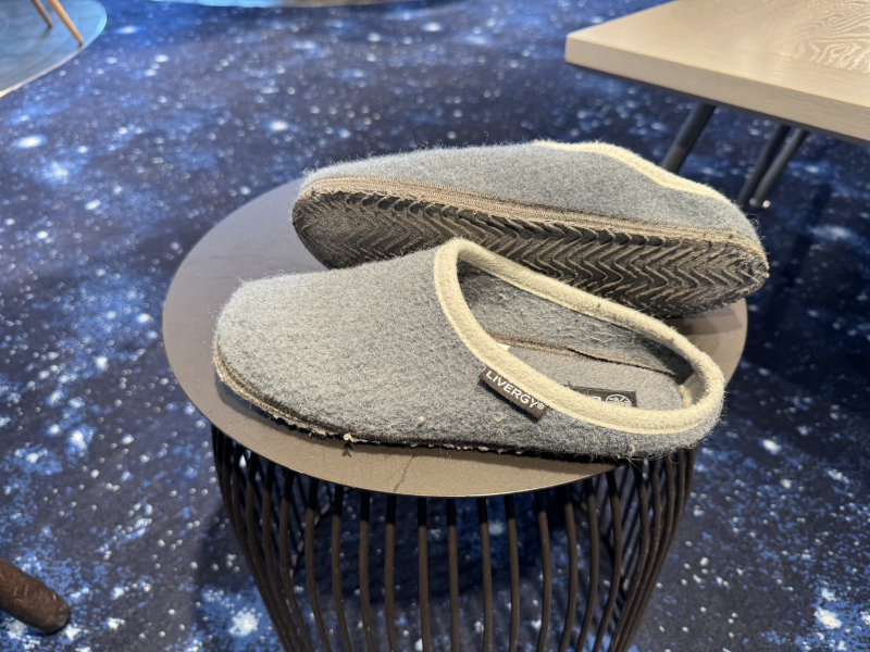 Slippers and slipping on smooth, hard surfaces
