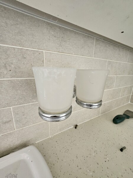 Removing wall mounted bathroom accessories