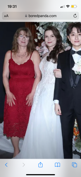 Mother in a bikini and see through overall on daughter's wedding