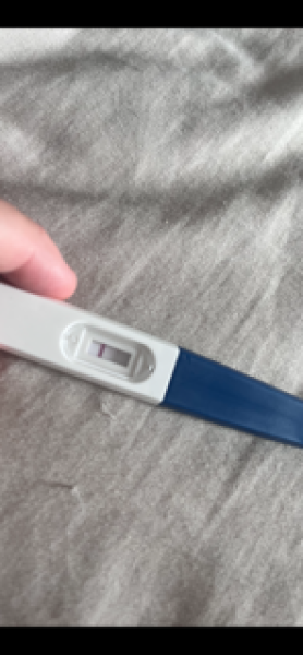 Is my pregnancy test showing a faint positive or an evaporation line?