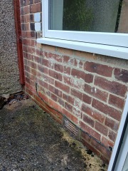 What is this patch on the wall?