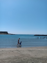 Where might we choose to holiday if we like sunny old towns, cafe culture, markets and white beaches.