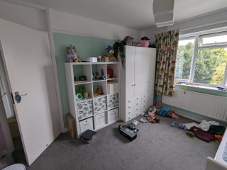 Baby sharing room with 8 year old