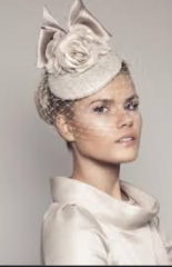 MN has spoken, fascinators are awful, wide headbands are OK, your thoughts on this one please