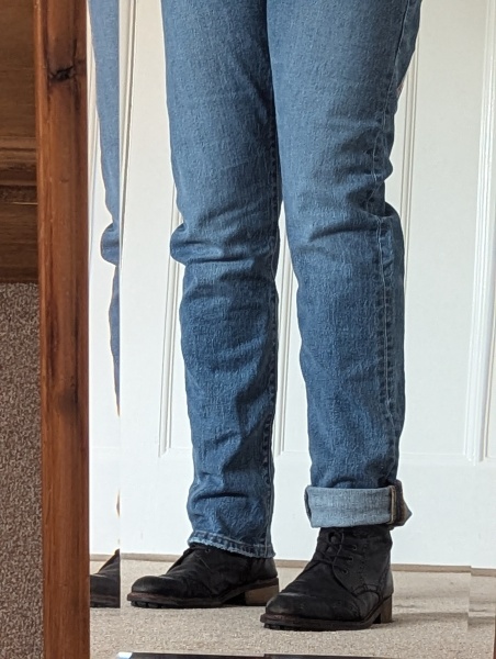 Comfortable winter footwear with jeans.