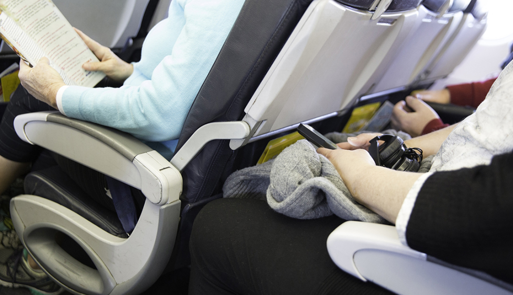 Reclining seat on a plane