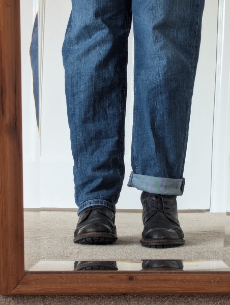 Comfortable winter footwear with jeans.