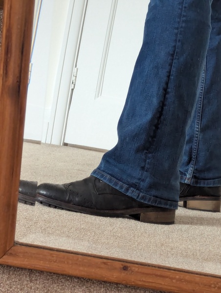 Comfortable winter footwear with jeans.