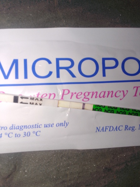 Faint positive pregnancy test, need your eyes