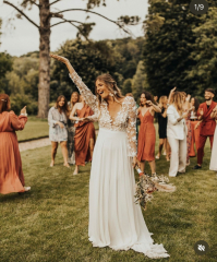 Wedding dress that would be suitable for possible pregnancy? Best shape?