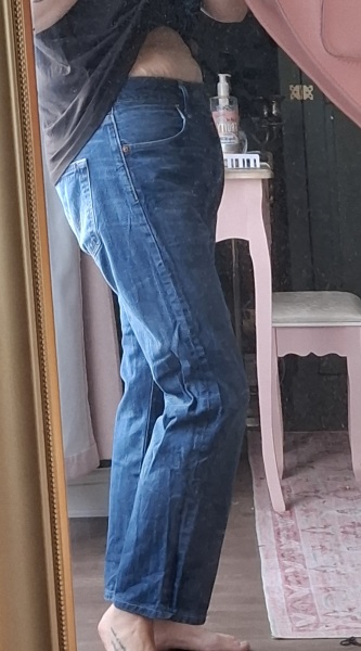 If my husbands 34waist jeans fit me, what size women's jeans should I buy?