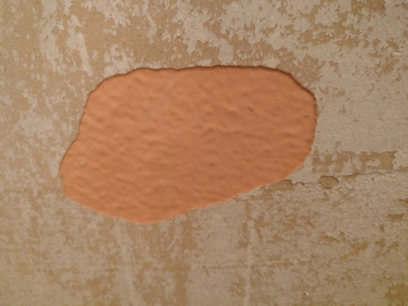 What is this under the wallpaper?