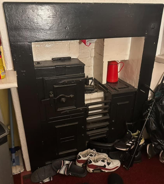 Anyone ever opened up a boarded-up fireplace?