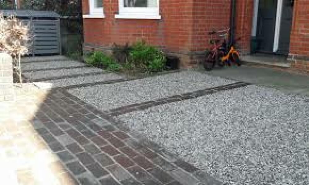 Gravel drive - neighbour unhappy