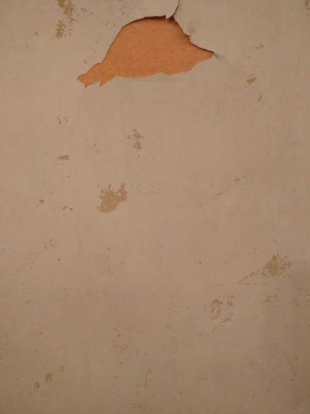 What is this under the wallpaper?