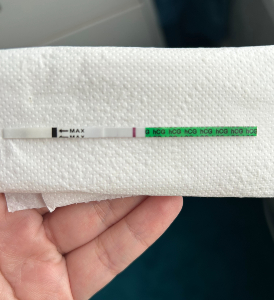 9dpo, anyone else see a faint line??