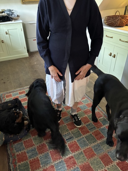 Cardigan nipped in at waist, flared over hips