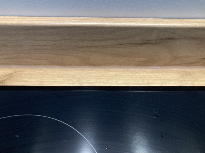 Help! Really poor sealant between worktop and upstand