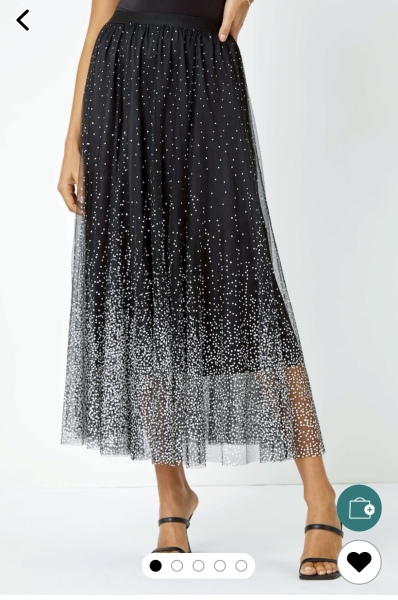 How would you style this skirt for Christmas?