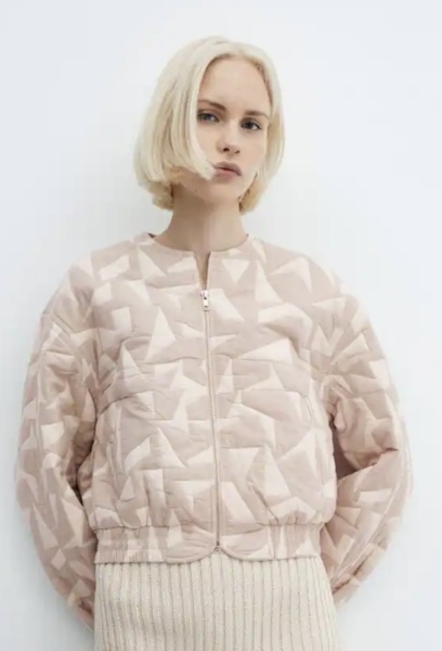 Jacket like this but black and beige