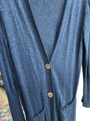 Cardigan nipped in at waist, flared over hips