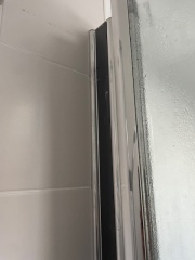 Will removing this shower screen ruin the tiles?
