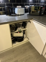 HELP. Horrible smell in 2 kitchen cupboards.