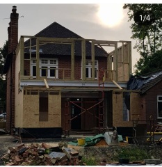 Hipped roof at the front of the house, gable at the back - does it look odd?