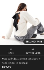 Looking for a jumper with a bow at the back