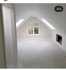 Hipped roof at the front of the house, gable at the back - does it look odd?