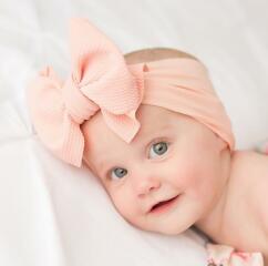 Am I a the only person that thinks those girl baby bows are horrific?