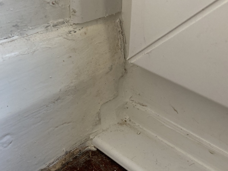 Sliding doors gap filled with squishy caulk