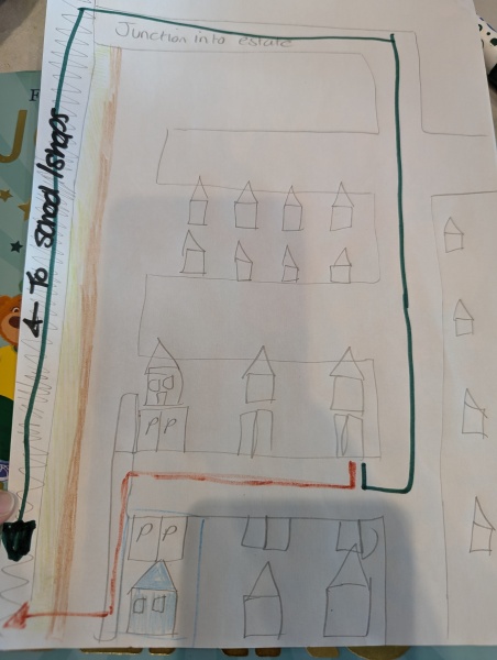 Neighbour climbs over the fence next to my house to get home.