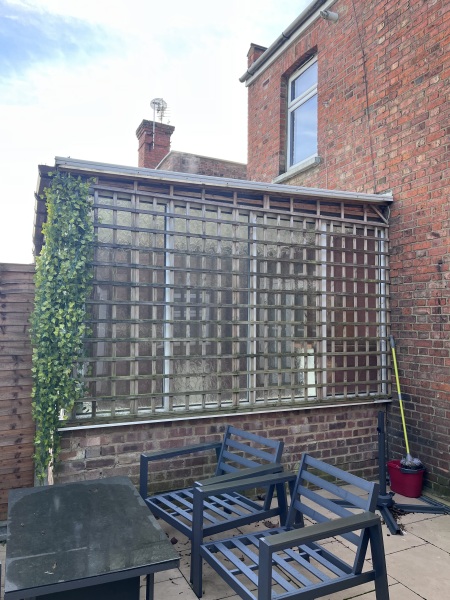 Neighbour has a massive window into our garden (pic)!