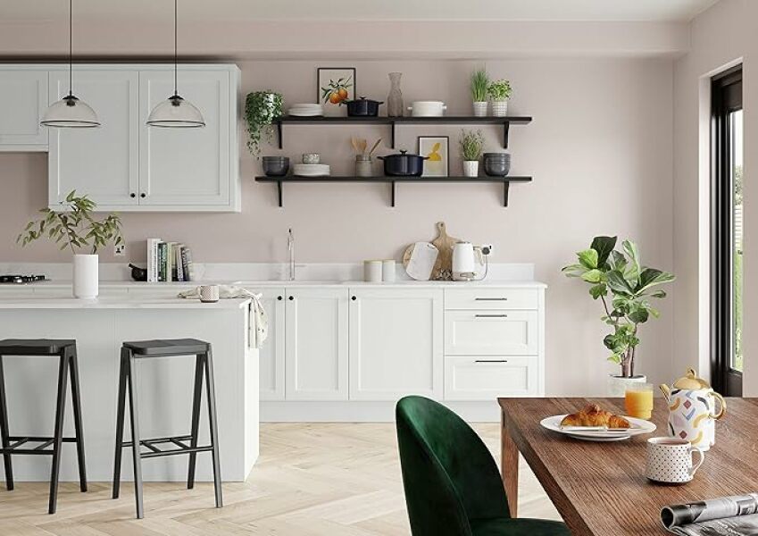 How can I have a cosy but tasteful living room when I have a black leather sofa?