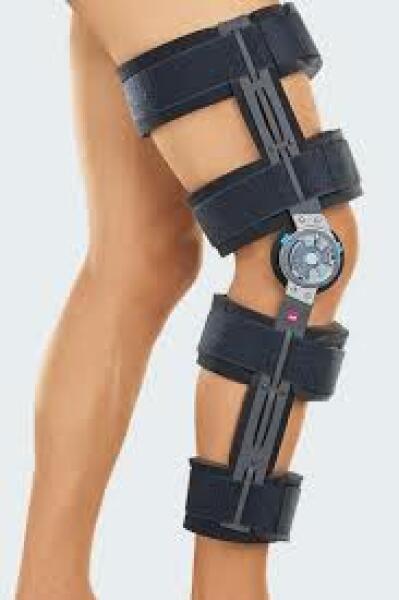 Help me find a Christmas party outfit that works with a knee brace!