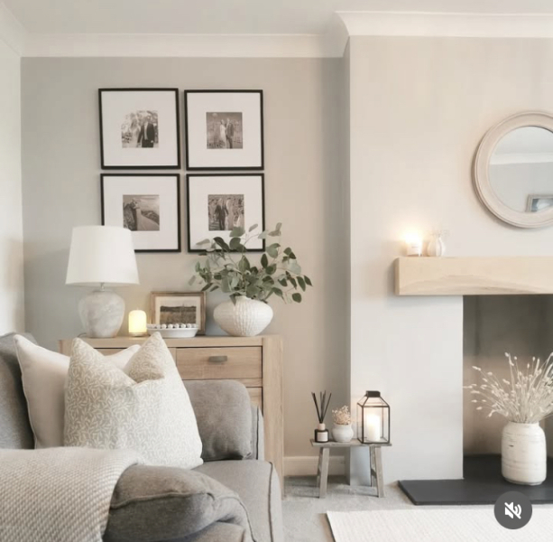 How can I have a cosy but tasteful living room when I have a black leather sofa?