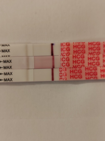 Friend thinks she may see a line... I can't and think she's wrong