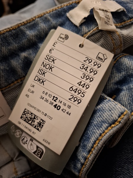If my husbands 34waist jeans fit me, what size women's jeans should I buy?